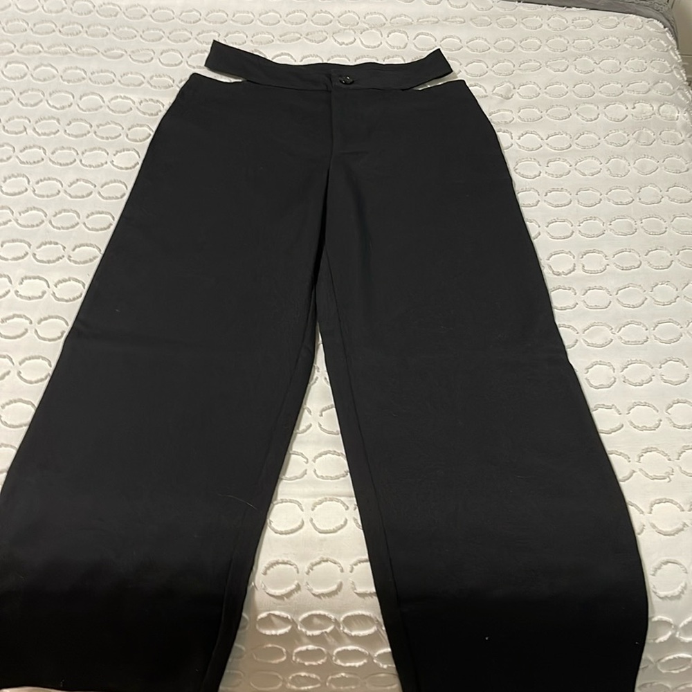 Black pants with opening on waist/hips